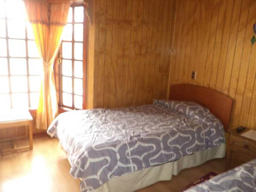 Hostal Lagunitas Puerto Montt Szoba fotó