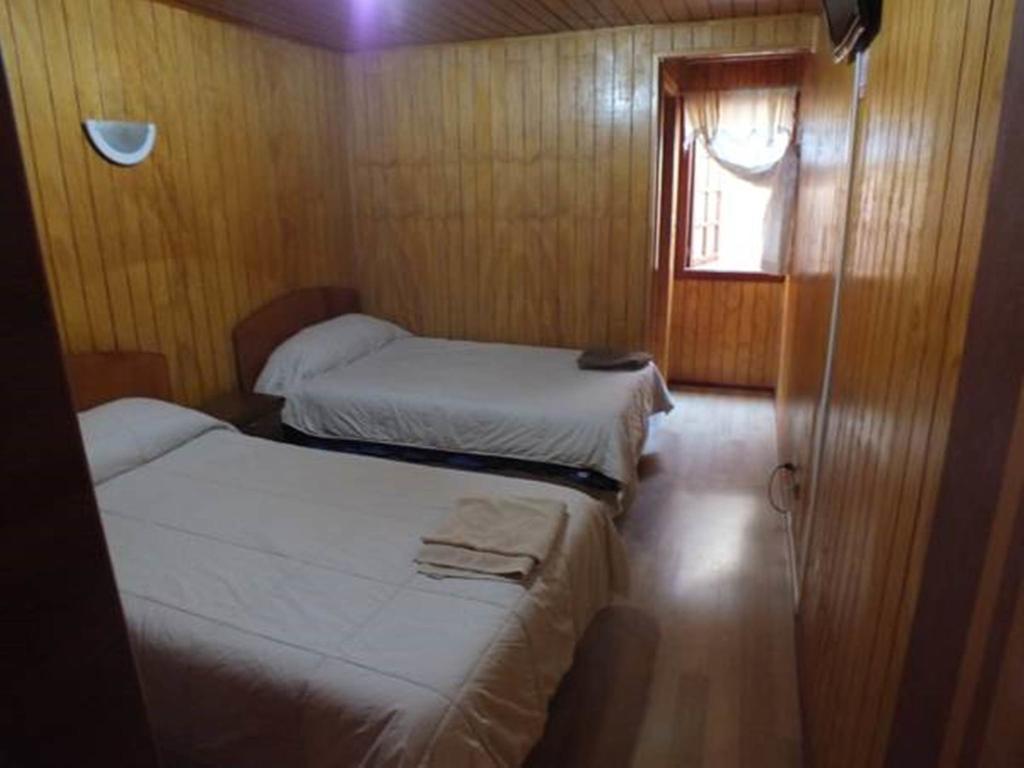 Hostal Lagunitas Puerto Montt Szoba fotó
